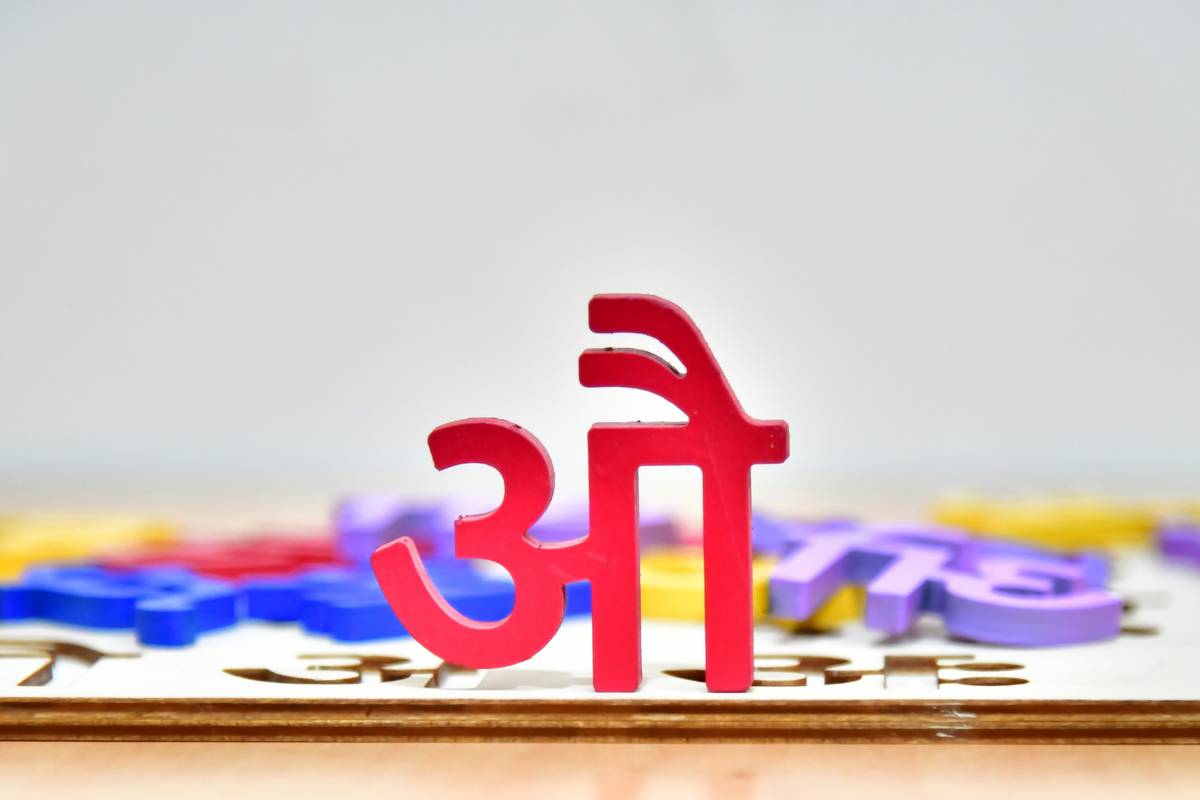 Infographic showing key Hindi terms for birthday ceremony: Janm Din (birth day), Sanskar (rite), Ashirwad (blessings), Kalash (sacred pot), Diya (lamp)